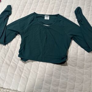 Whitney Simmons open back long sleeve cropped top